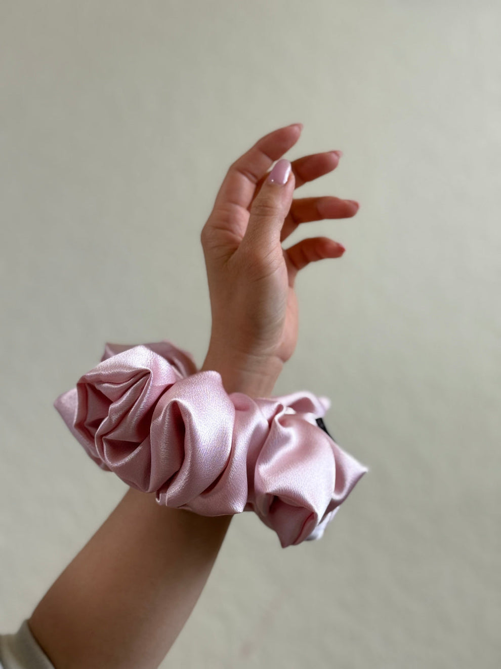 Amanda jumbo satin scrunchie in soft blush pink, made from smooth satin and designed for thick or long hair with a gentle, crease-free hold.