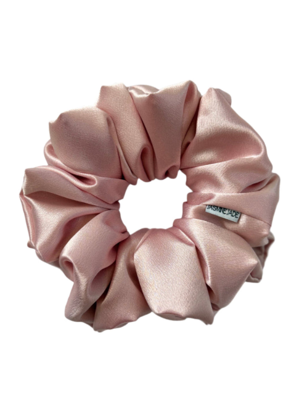 Amanda jumbo satin scrunchie in soft blush pink, made from smooth satin and designed for thick or long hair with a gentle, crease-free hold.