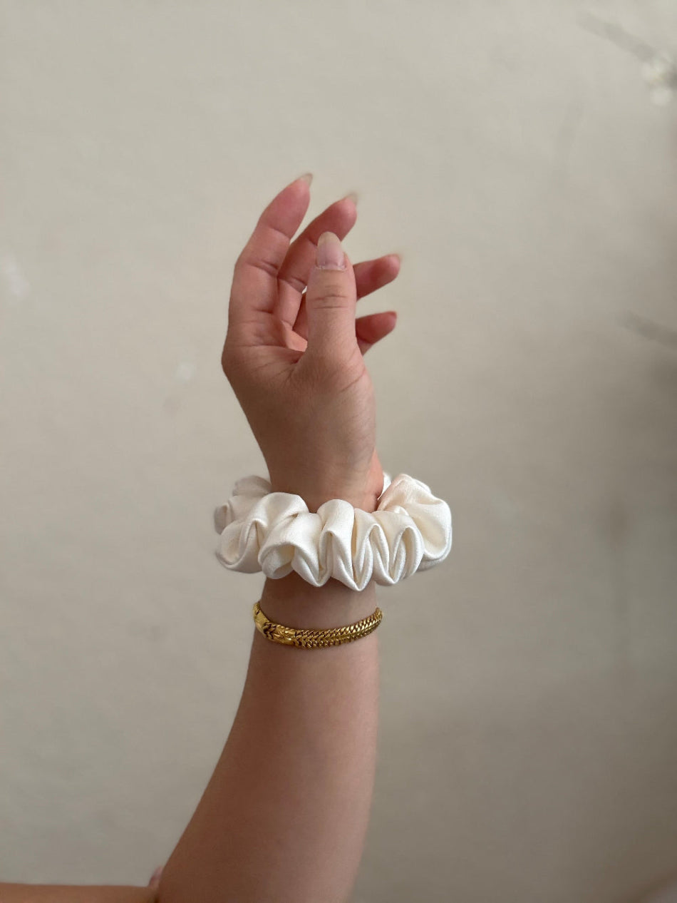 Extra small ivory satin scrunchie with matte finish, ideal for minimal hairstyles, handmade in Texas.