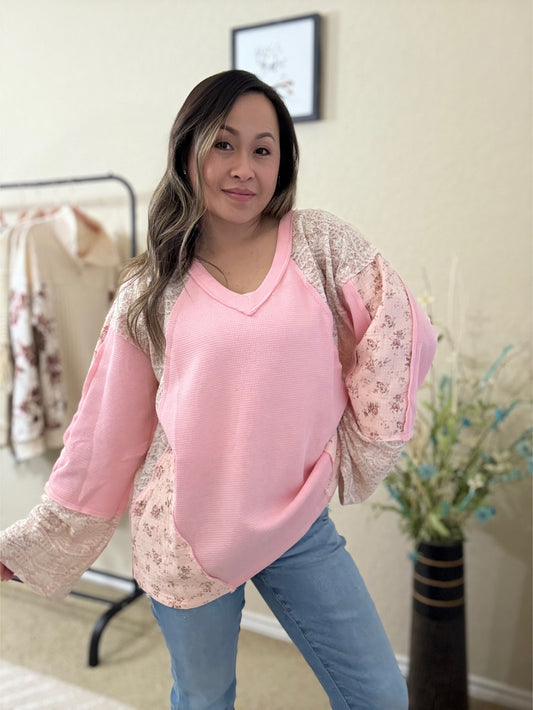 Front view of the Pink Long Sleeve Contrast Flower Thermal Knit Top featuring a soft pink fabric with delicate contrast flower details